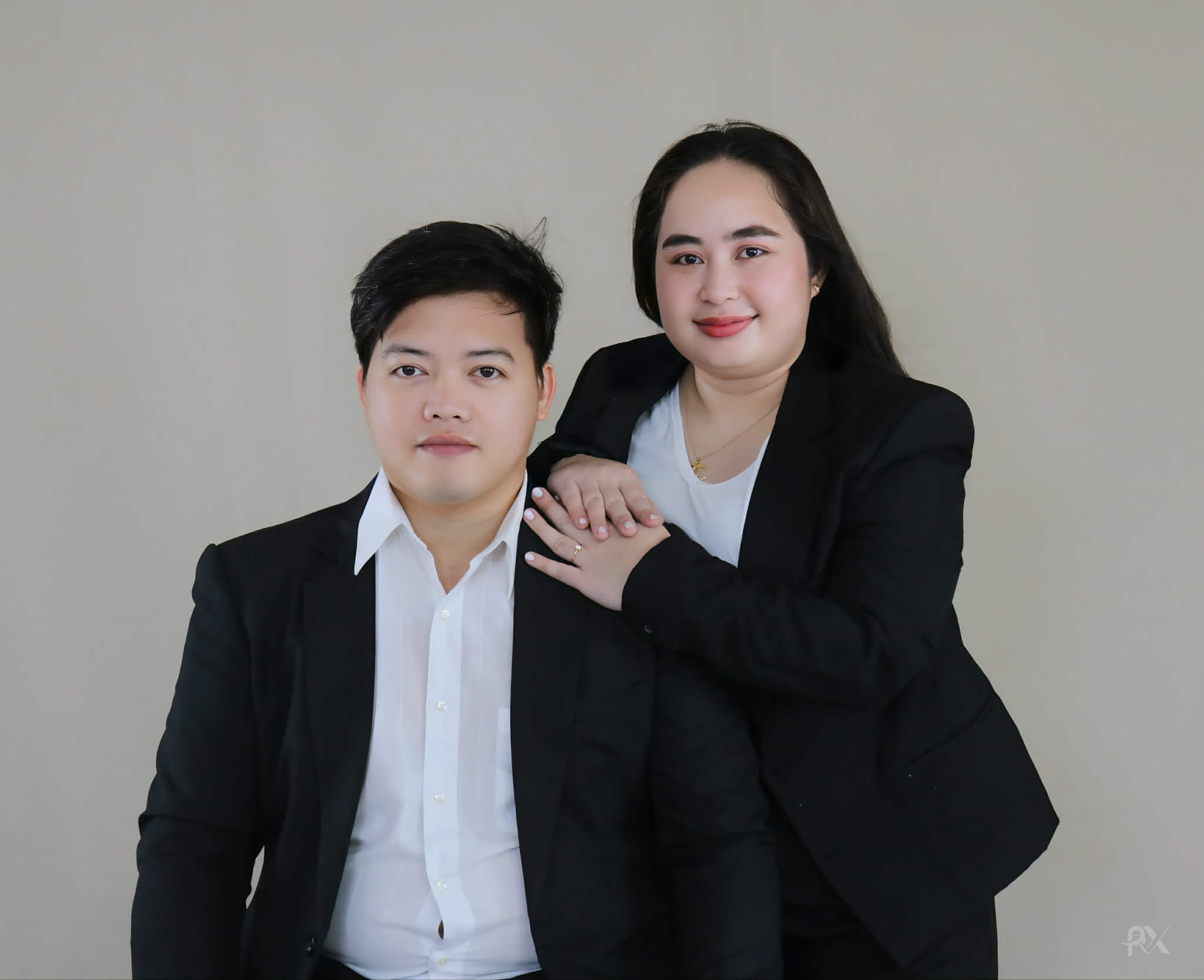Ryan and Margorie together in a formal studio portrait